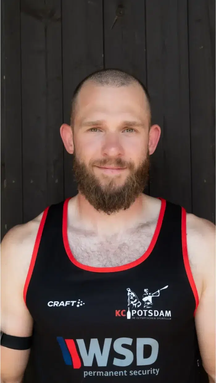 Max Lemke, dreifacher Olympiasieger, Porträt im KC-Potsdam-Trikot